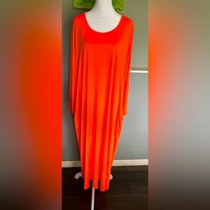 Orange dress XL long with long sleeves. Has pockets, new. No tags.